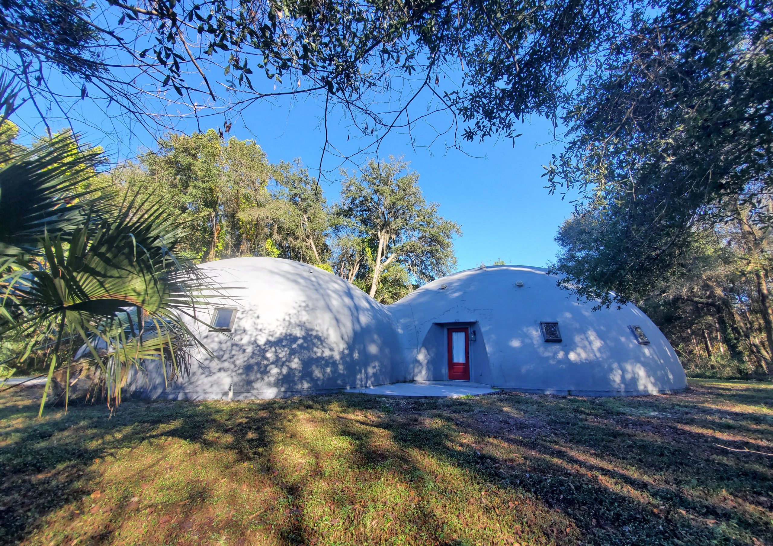 Eco-Conscious Haven: Exceptional Off-Grid 'Monolithic Dwelling' Available for Sale, Nestled on 1.6 Acres of Land