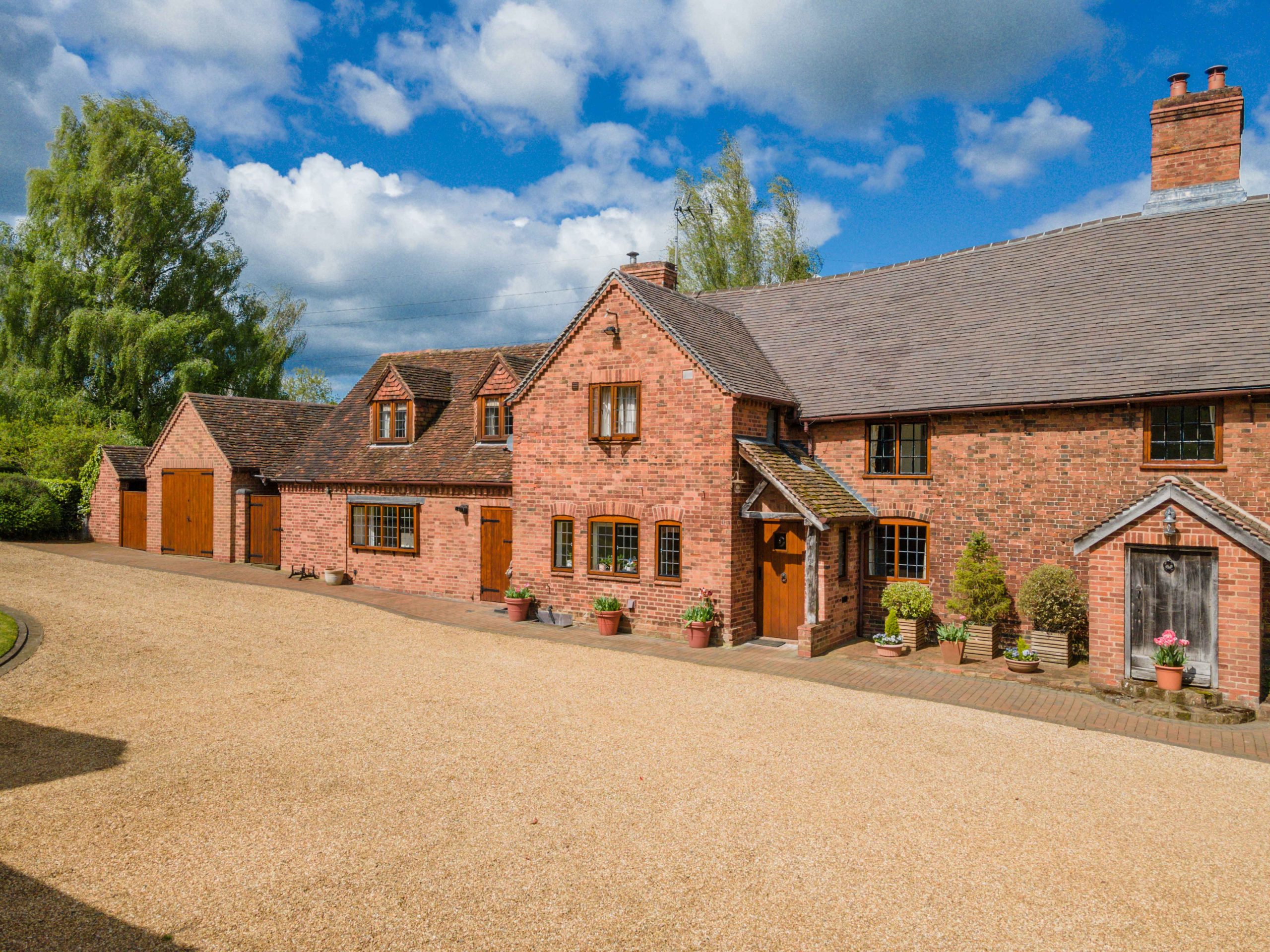 DM Co. Cuttle Pool Farm frontage scaled Fabulous 15th century four bedroom farmhouse near Knowle on market for £1.5 million