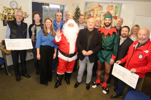 Andrew Hayward MD at Russell Roof Tiles centre with Lochmaben Charities and Team MANUFACTURER BRINGS CHRISTMAS CHEER TO COMMUNITY CAUSES