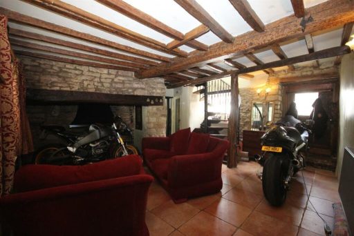 Jam Press JMP422412 Charming £275,000 Cottage Surprises Viewers with Two MOTORBIKES in the Living Room
