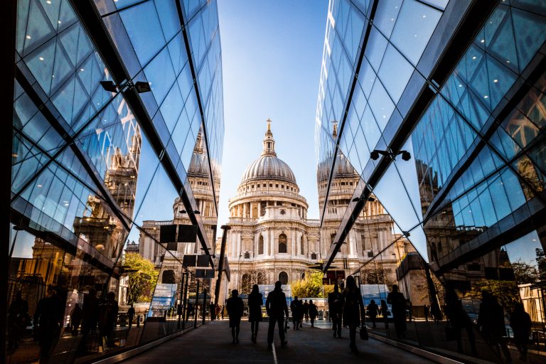 Urban crowd and futuristic architecture in the city, London, UK