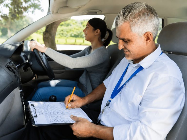 Learner driver using the best driving test app to prepare for a practical driving test