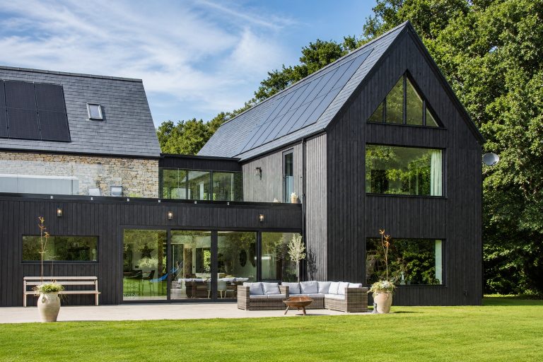 The real cost of triple glazing in 2026 (and how long it takes to pay you back) Triple glazed windows installed on a modern UK home