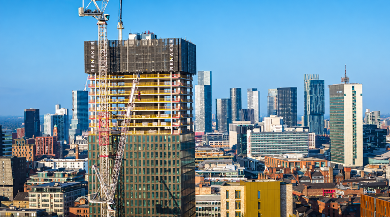 Navigating Sustainability and Compliance Demands in Modern Building Projects Modern construction project illustrating sustainability and building compliance